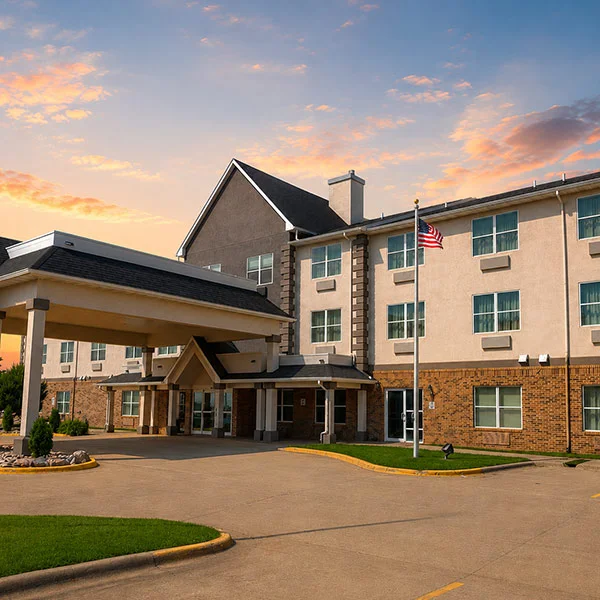 Heritage Hotel and Suites Exterior at Sunset