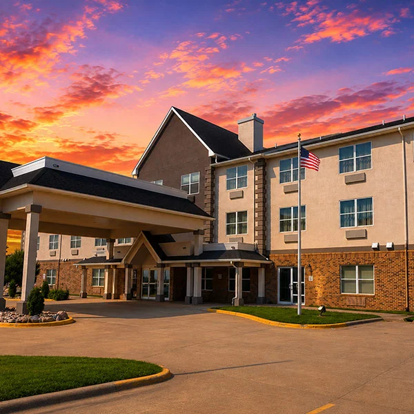 Heritage Hotel and Suites Exterior at Dusk